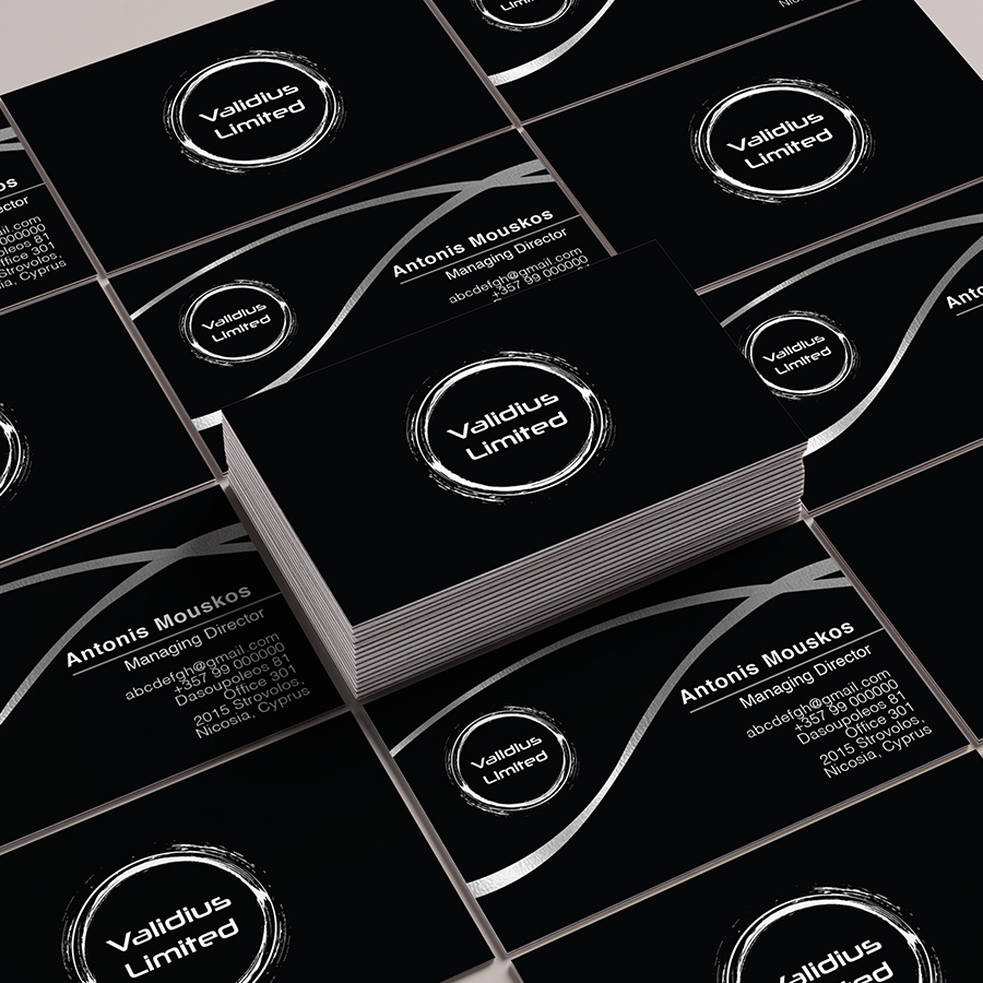 Black business cards with white logo centered on the back side. Front silver curves with white text and logo.